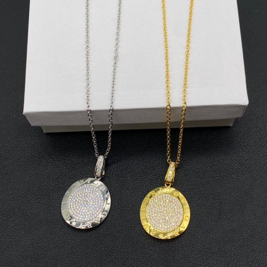 BVLGARI 18 kt rose gold and silver pendant set with pavé diamonds