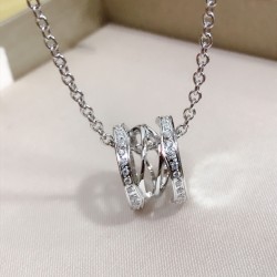 BVLGARI B.zero1 necklace with 18 kt white gold chain and 18 kt white gold round pendant set with pavé diamonds on the edges.