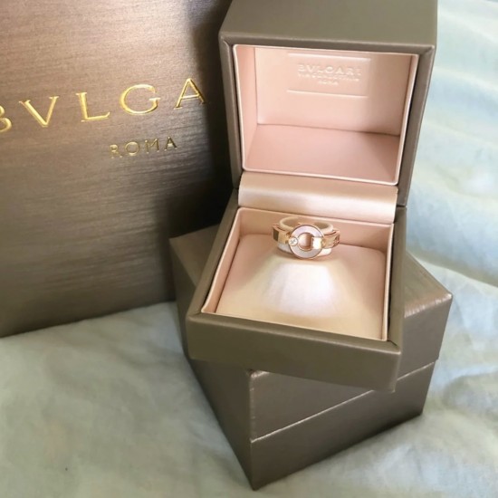 BVLGARI Openwork 18 kt rose gold ring with mother-of-pearl elements and a round brilliant-cut diamond